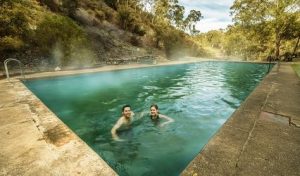 Read more about the article Yarrangobilly Caves’ thermal pool, fed by a natural spring, is accessible via …